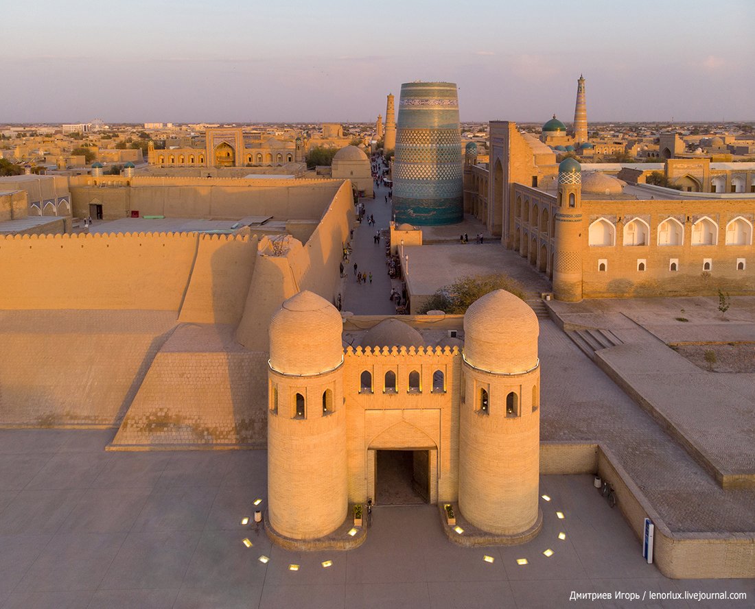 Panoramic view of Ichan-Kala towers and old city walls at sunset